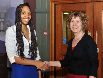 Adaeze Iheobi being presented with her prize by Dr. Julia Shelton