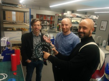 Hugh is photographed with his two examiners, Kaspar (on the left) and Guiseppe (on the right) in teh SEMS lab where he made all his devices.