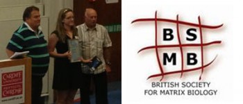 Clare collecting her award at the BSMB meeting from prof Vic Duance (right)