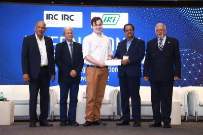 Aaron (in the middle) receiving his 2nd prize at the IRC2022 closing ceremony