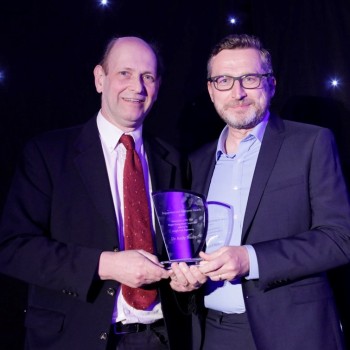 Andy Bushby receiving the Award from Graeme Browne, Director of Queen Mary Innovation.
