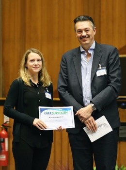 Kathrin is pictured receiving the award from Prof. Nigel Brandon of Imperial College
